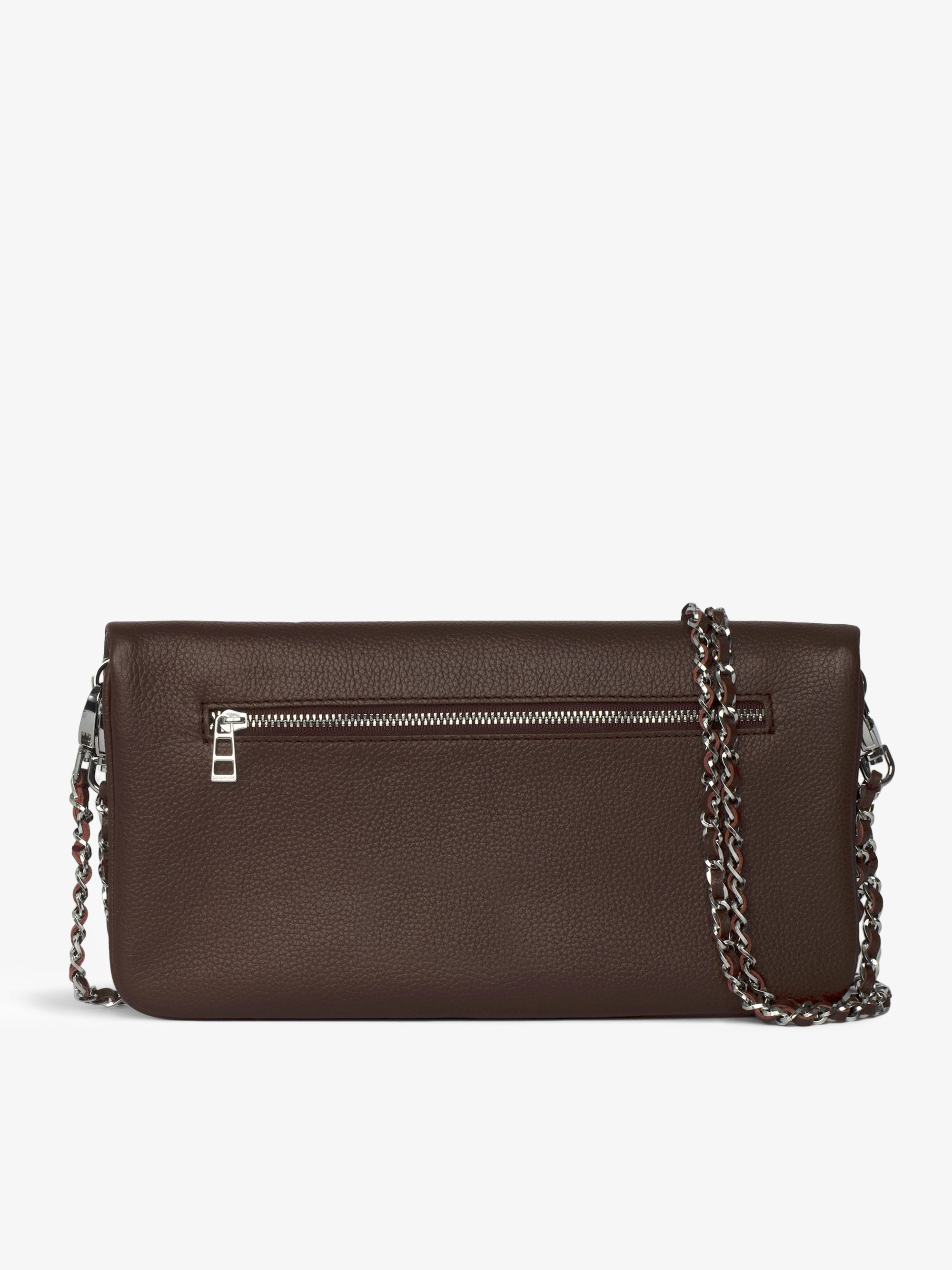 Rock Clutch - Grained leather clutch with double leather and metal chains and rhinestone-embellished wings.